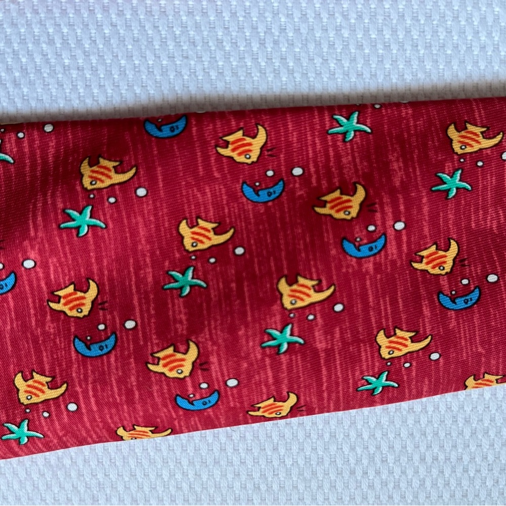 Hermes rust tie with fish